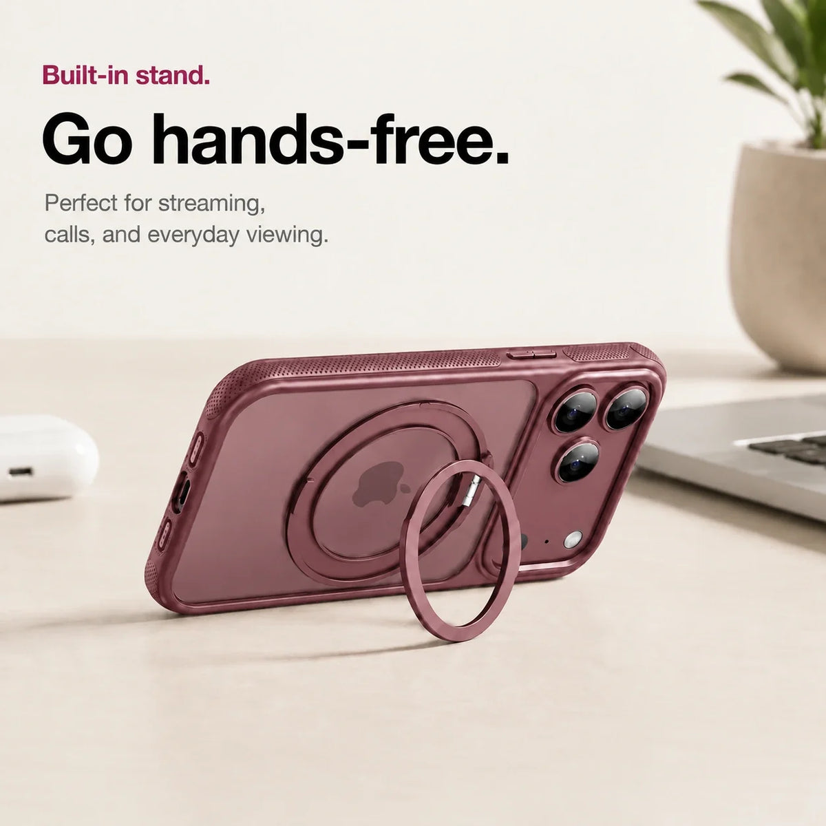 Cherry clear phone case propped horizontally on its ring stand on a desk #color_Dark Cherry
