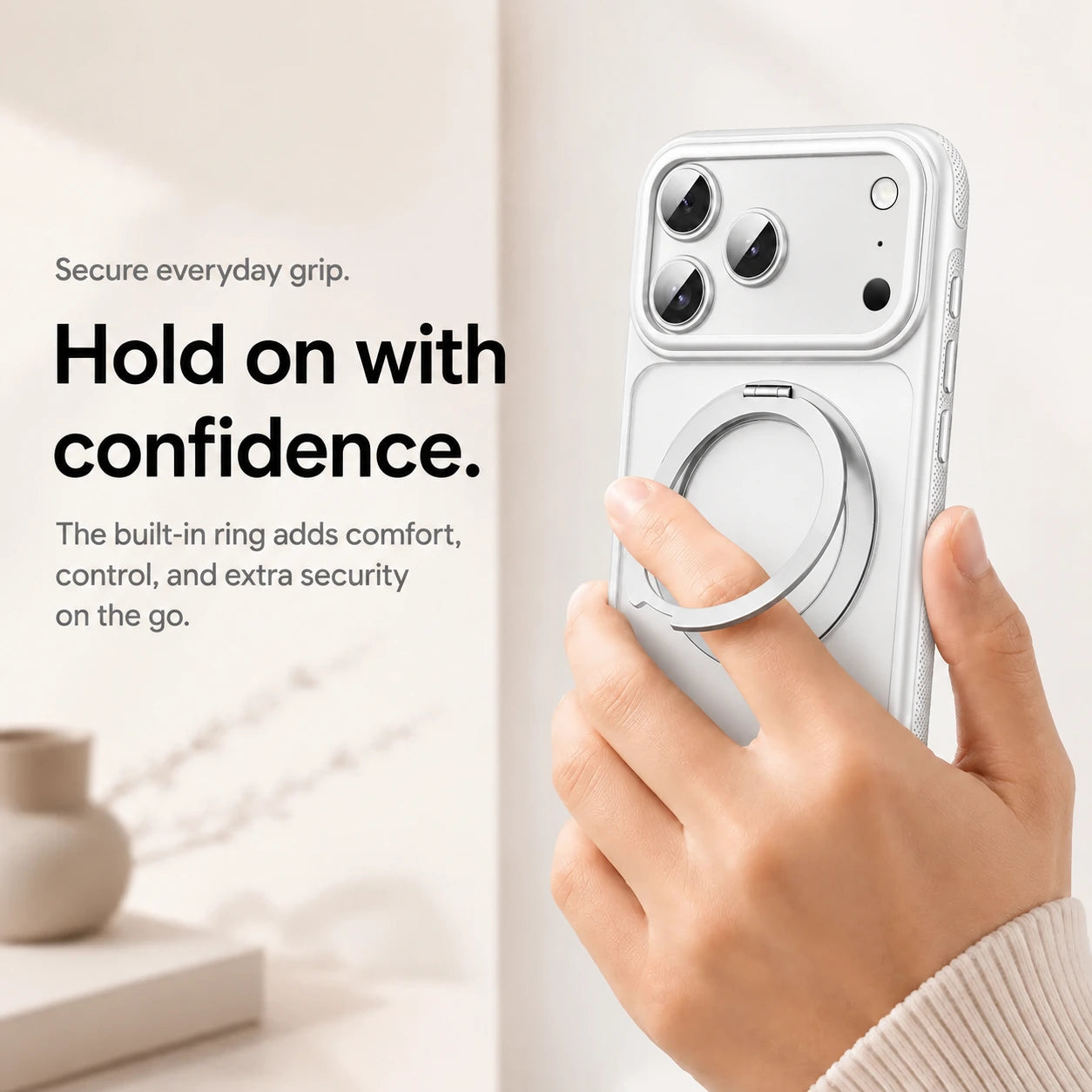 White magnetic phone case held with a finger through the adjustable ring grip #color_Polar White